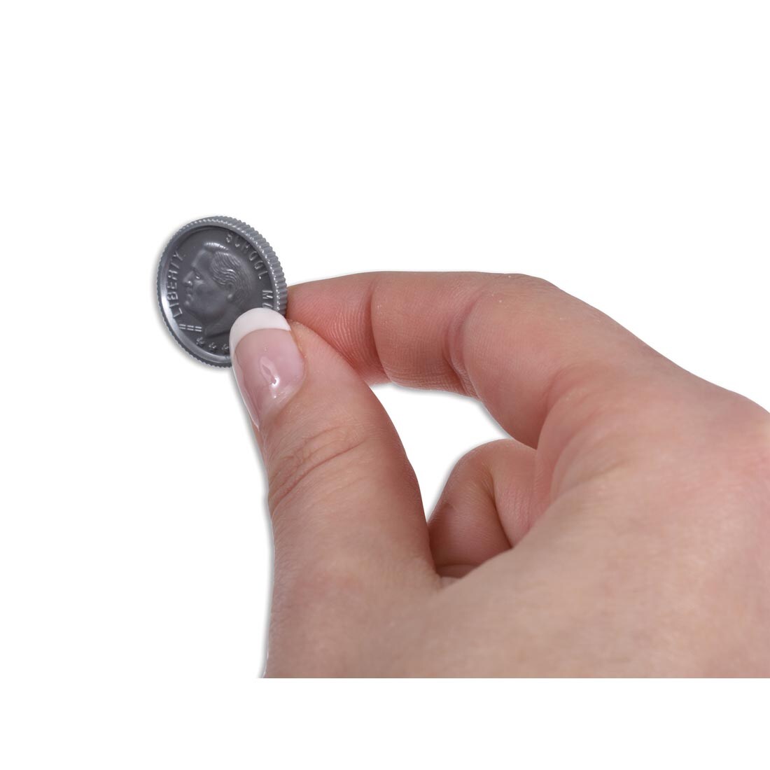 hand holding a dime from the Play Money Plastic Dimes set