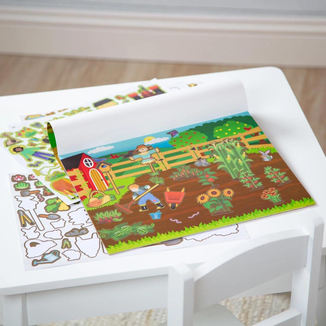a page and stickers from the Farm Reusable Sticker Pad By Melissa & Doug