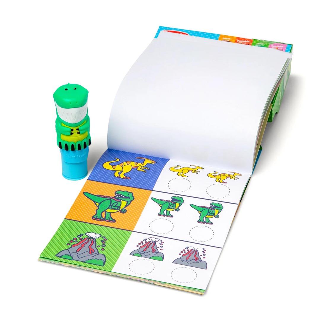 stamper plus open book from the Dinosaur Sticker Wow! Set By Melissa & Doug