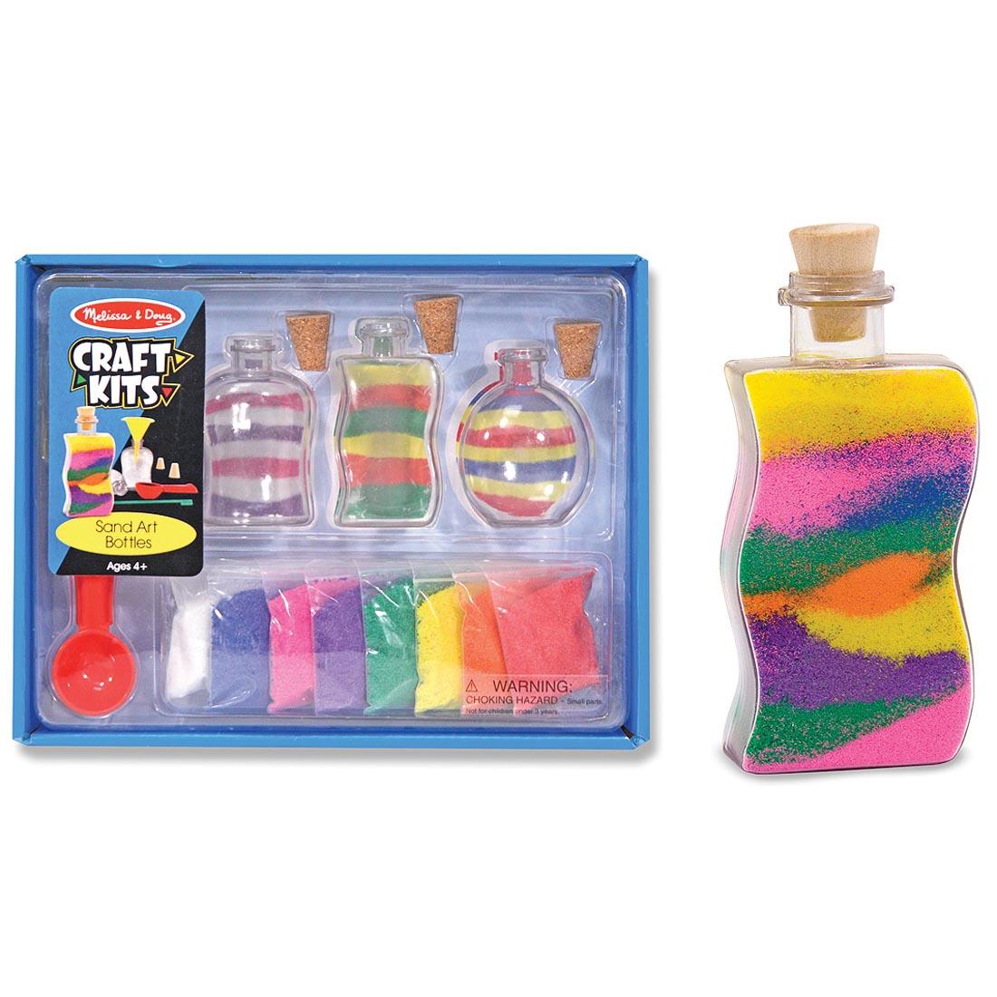 Sand Art Bottles Craft Kit shown next to a completed craft
