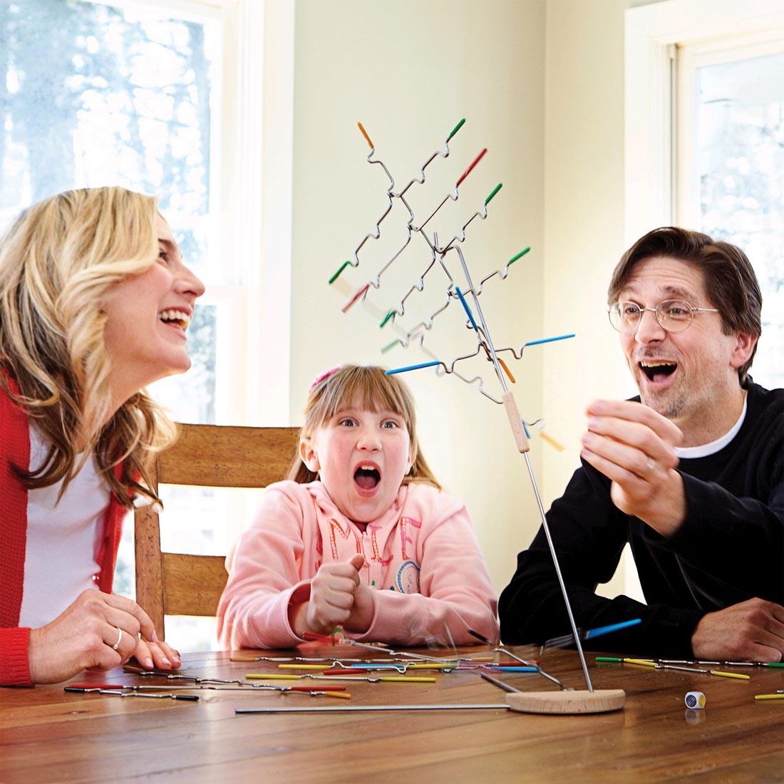 three people playing the Suspend Family Game