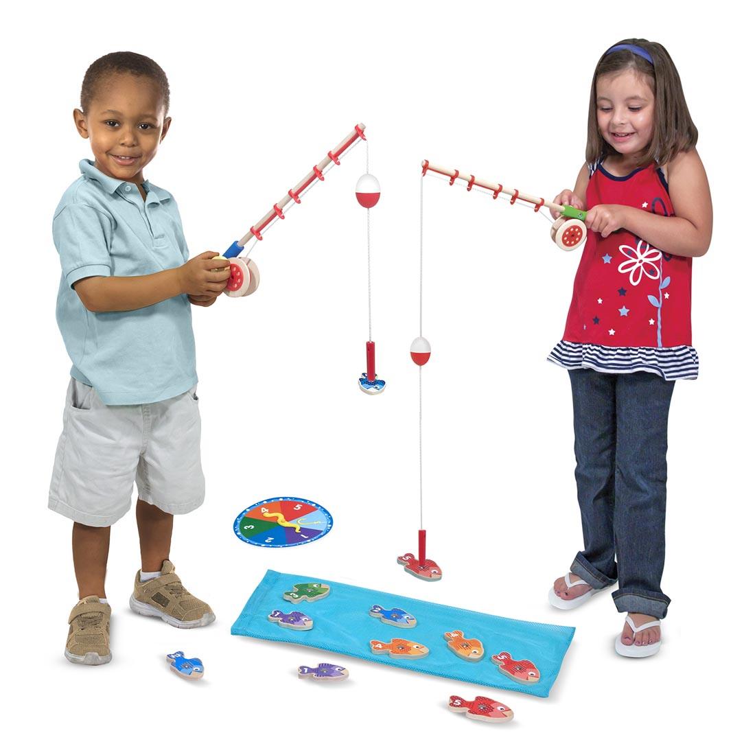 two children playing the Catch and Count Fishing Game