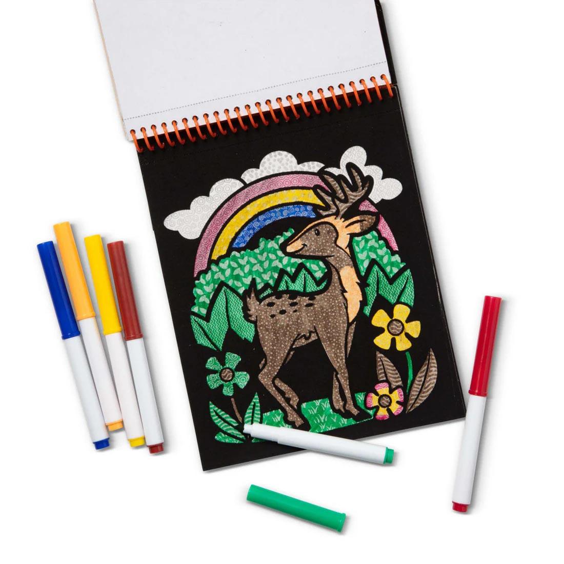 6 markers plus a page mostly completed from the Magic Velvet Animals Pattern-Reveal Pad By Melissa & Doug