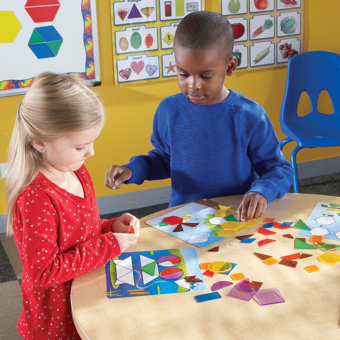 2 children using the Shapes Don't Bug Me Geometry Activity Set By Learning Resources