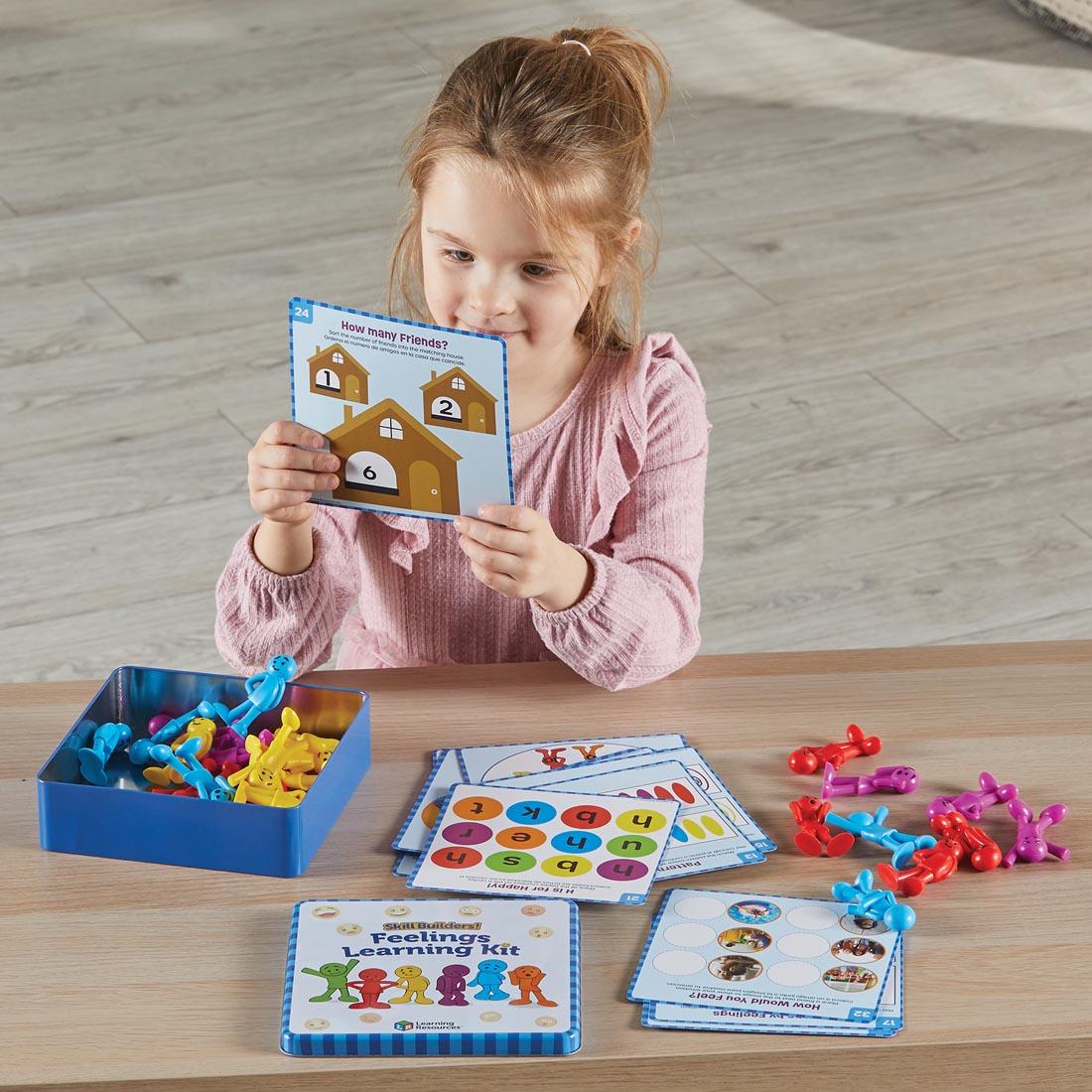 child using the Skill Builders! Feelings Learning Kit By Learning Resources
