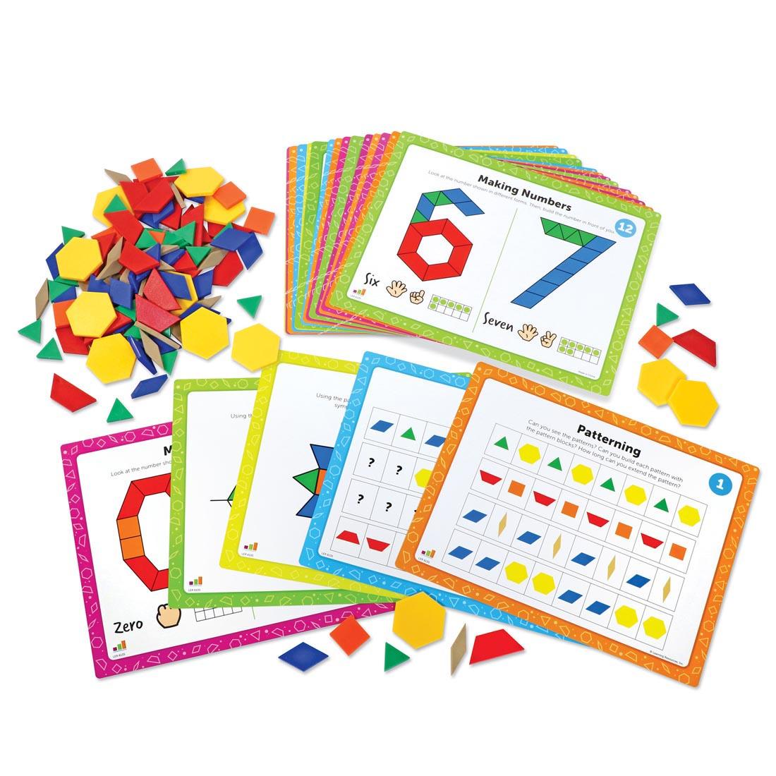 Several activity cards and pattern blocks from the Pattern Block Math Activity Set By Learning Resources