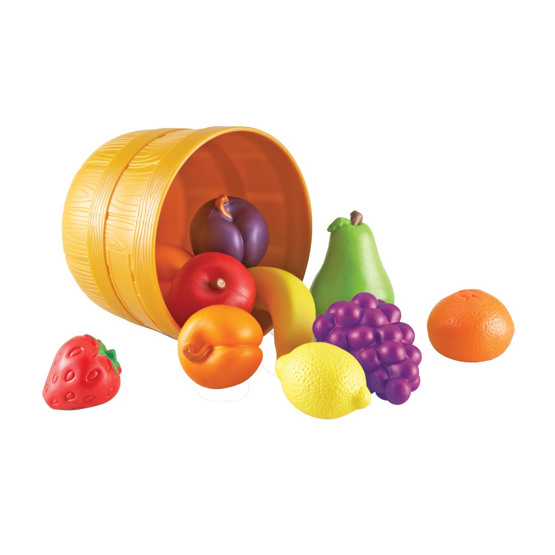 toy bushel basket tipped over to spill out colorful plastic fruit