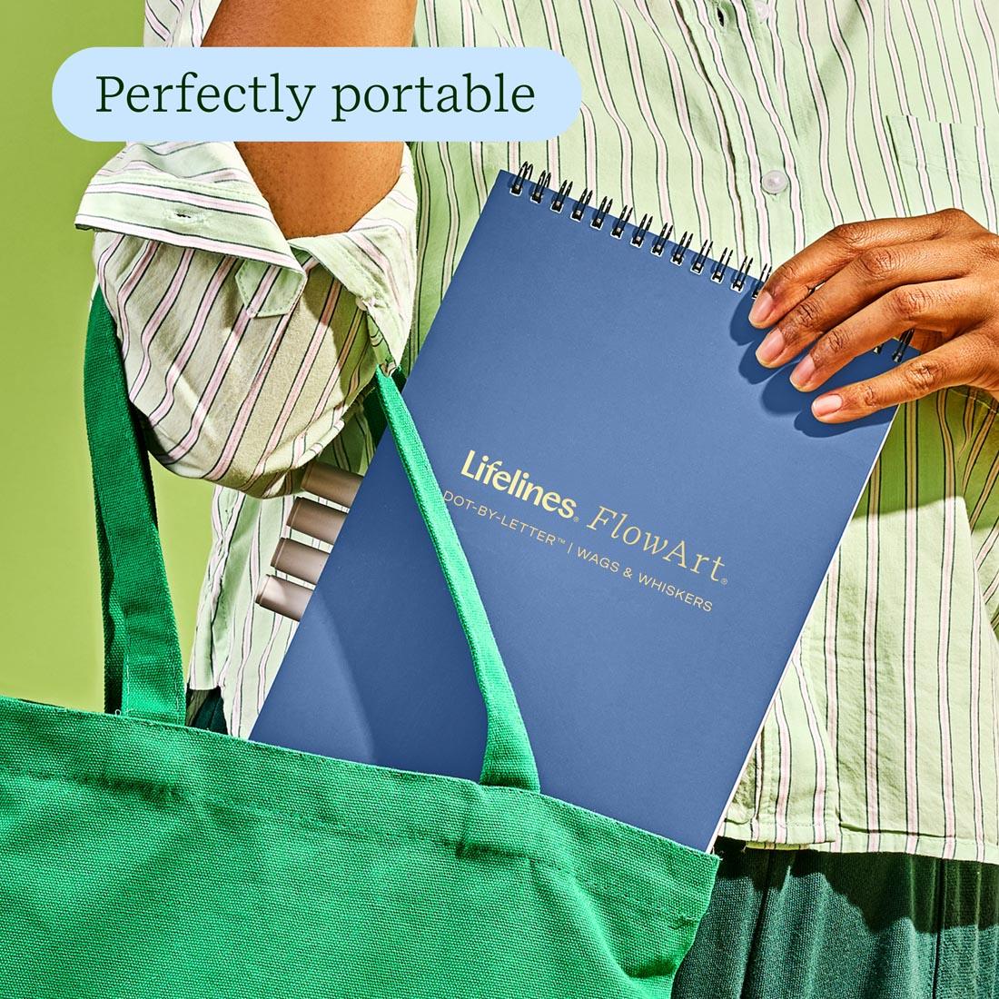 hand putting Wags & Whiskers Dot-By-Letter FlowArt by Lifelines into a tote plus text Perfectly portable