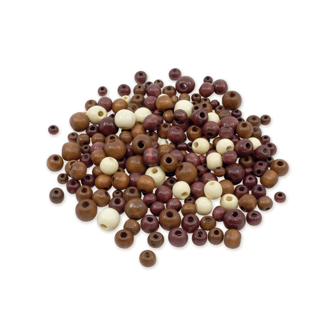 a pile of round wooden beads in a variety of sizes and natural colors
