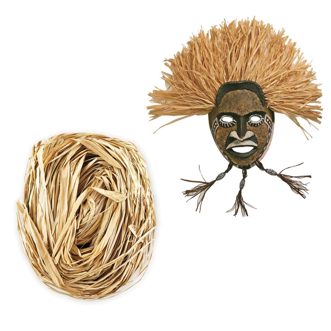 Bundle of natural raffia with an African mask made using it