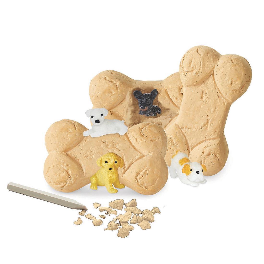bones and dog figurines from the Dig It Up! Discoveries Puppies By Mindware