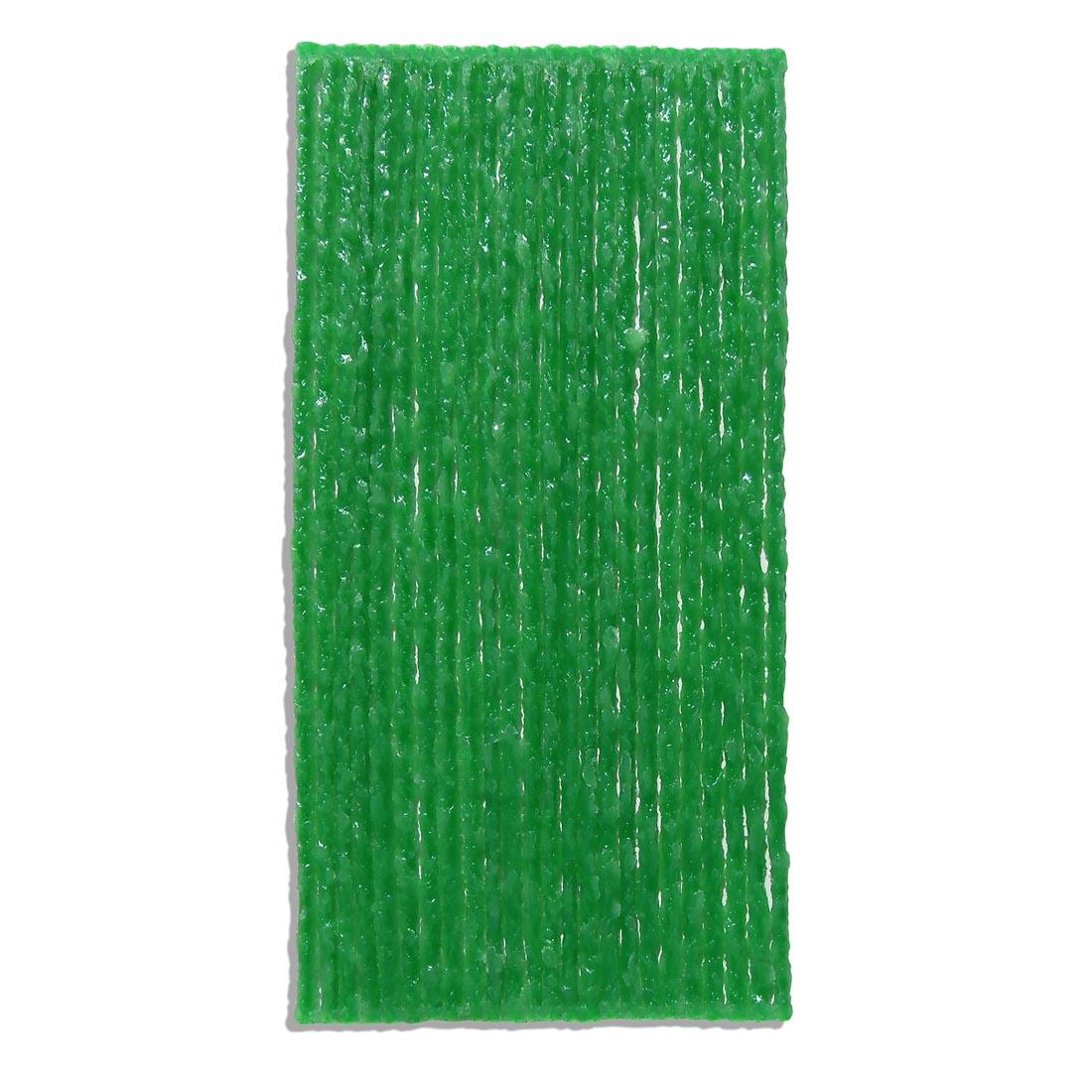 yarn pieces coated with light green wax