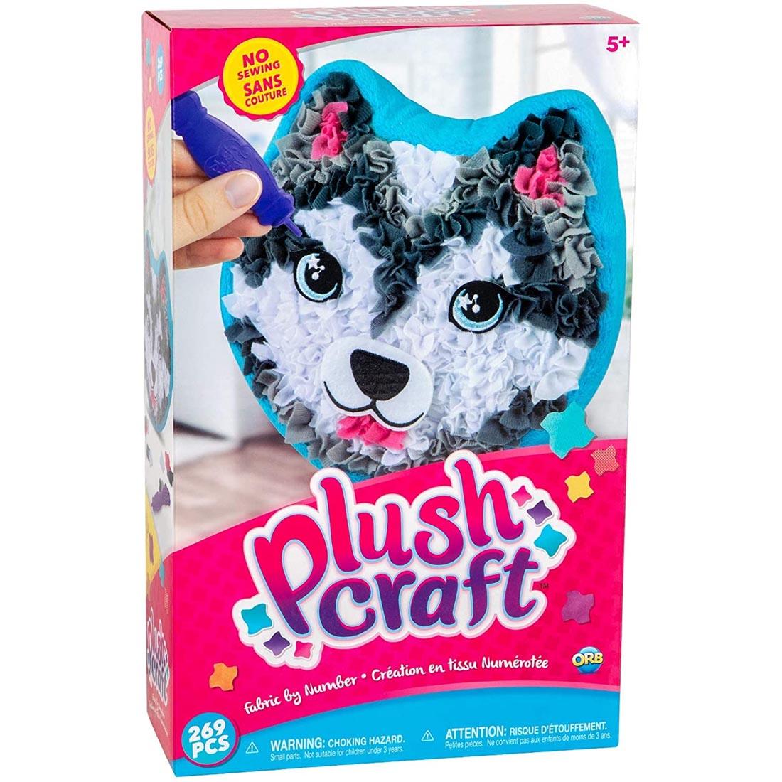 fabric-by-number craft with a husky-shaped pillow