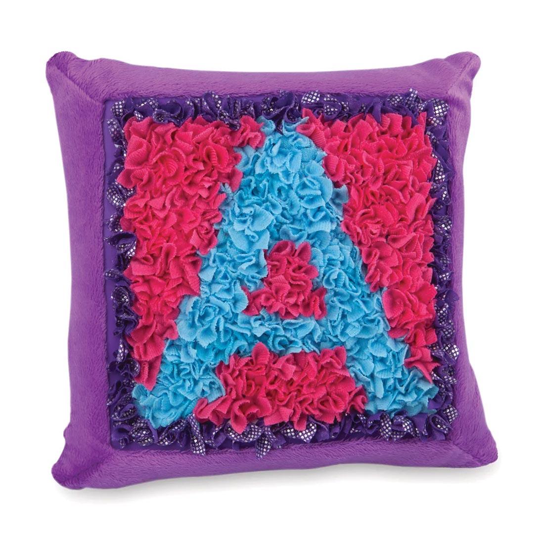 square pillow with letter A on the front