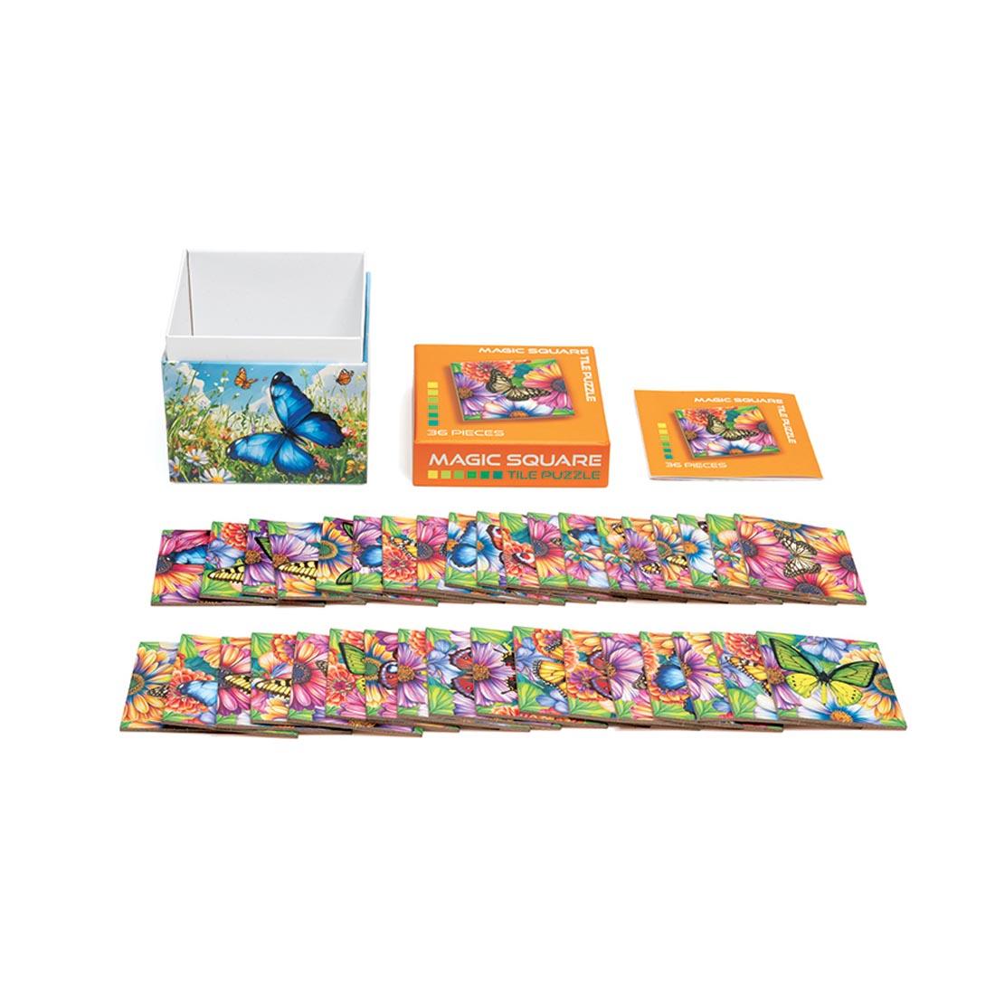 open box and pieces of the Butterflies 36-Piece Magic Square Tile Puzzle