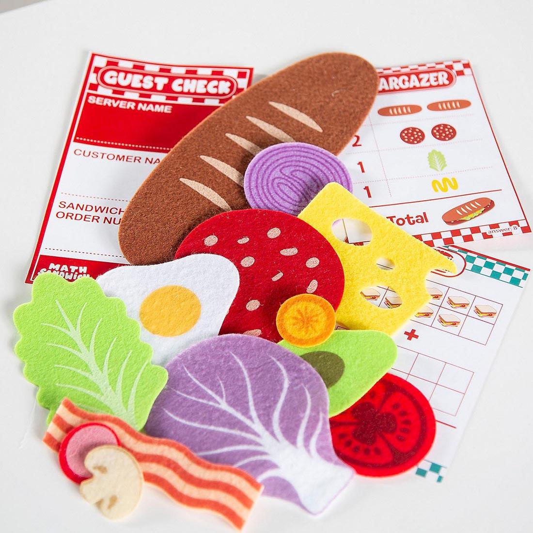 felt food pieces and menu cards from the Math Sandwich Preschool Math Game By Peaceable Kingdom