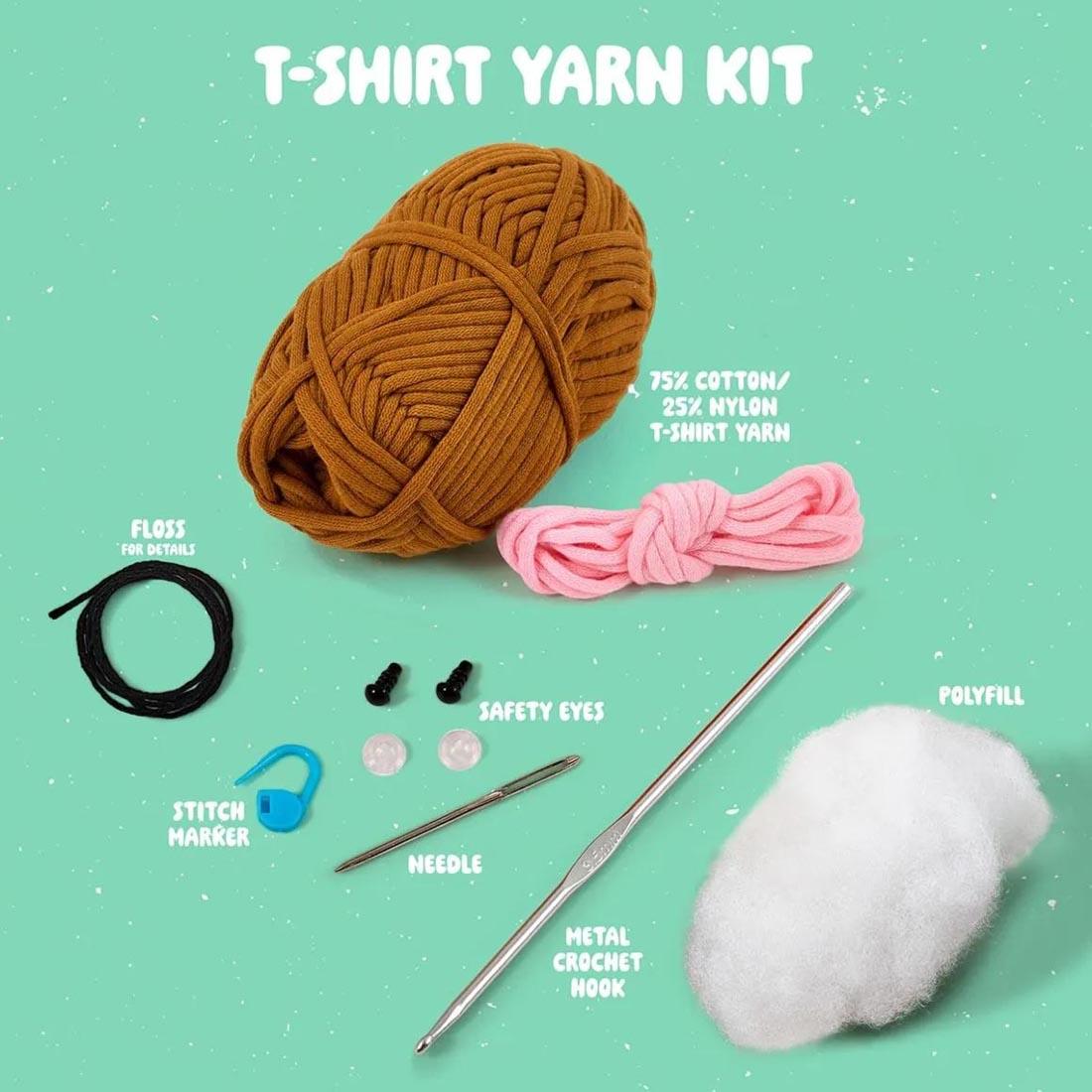 components of Billy The Bear Complete Crochet Kit labeled: T-Shirt Yarn Kit; 75% Cotton/25% Nylon T-Shirt Yarn; Floss For Details; Safety Eyes; Stitch Marker; Needle; Metal Crochet Hook; Polyfill