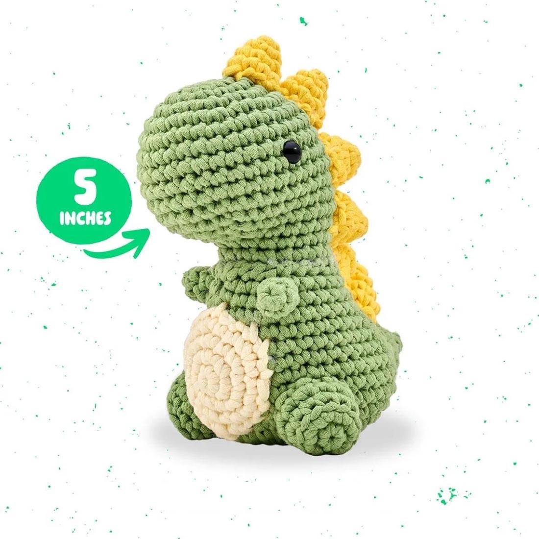 a completed example using the Dan The Dino Complete Crochet Kit with text 5 inches