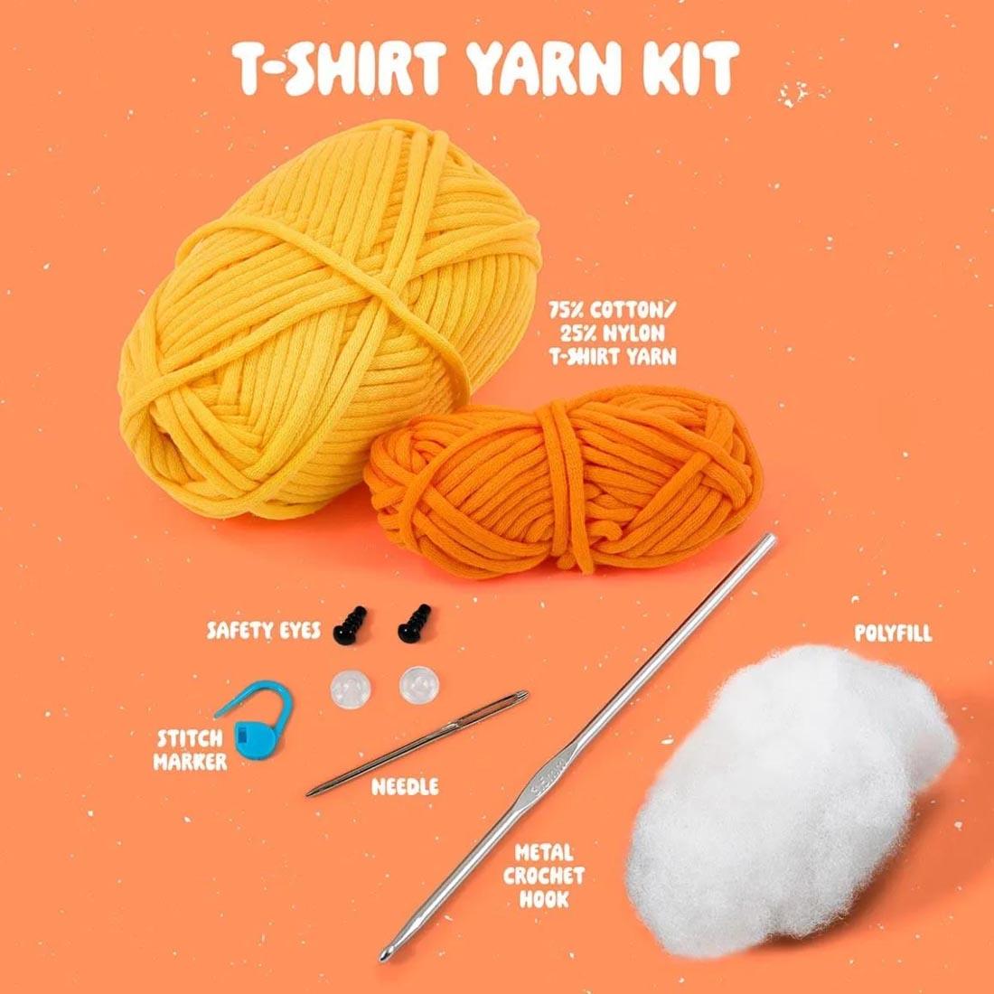 components of Quackers The Duck Complete Crochet Kit labeled: T-Shirt Yarn Kit; 75% Cotton/25% Nylon T-Shirt Yarn; Safety Eyes; Stitch Marker; Needle; Metal Crochet Hook; Polyfill