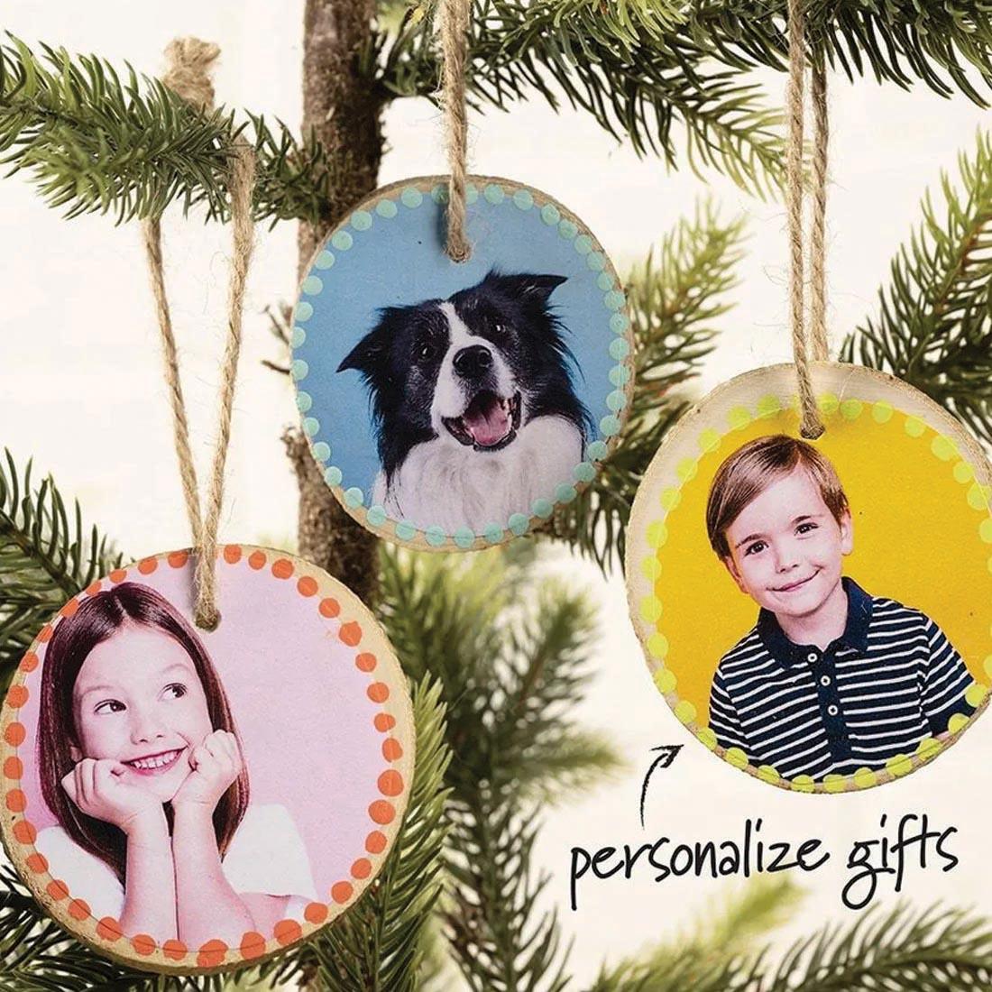 3 examples of decorated Wood Slice Ornaments hanging on a tree, with text: personalize gifts