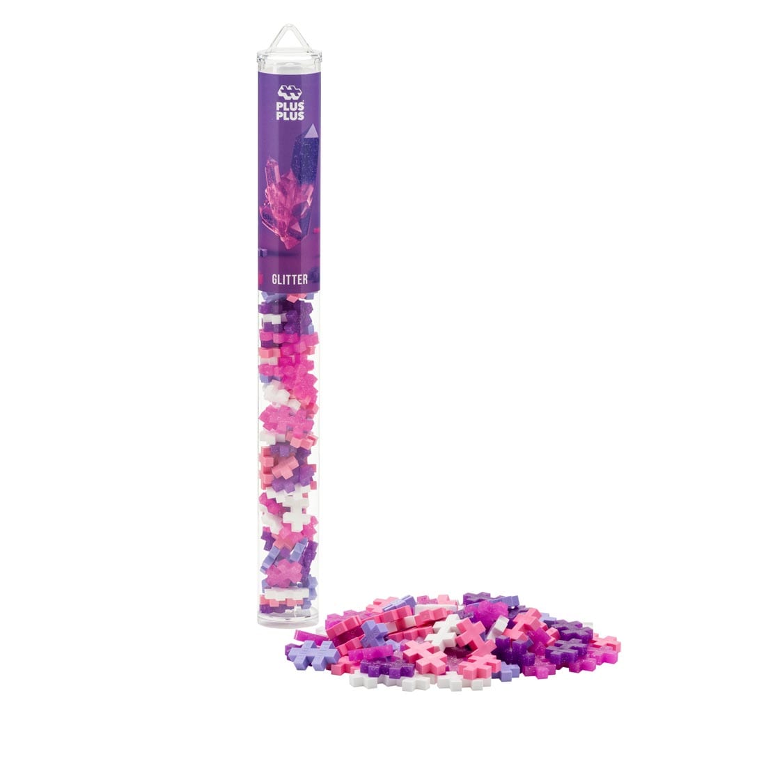 Plus-Plus 70-Piece Glitter Mix Tube package beside a pile of plus-plus pieces