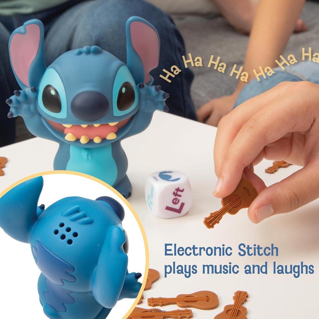 parts of the Laughing Stitch Game plus text Electronic Stitch plays music and laughs; ha ha ha ha ha