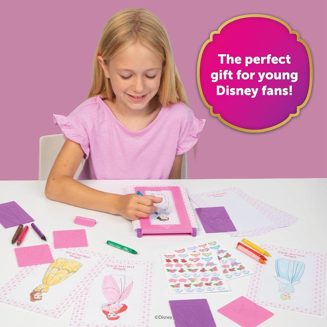 child using the Disney Princess Fashion Plates Set with text The perfect gift for young Disney fans!