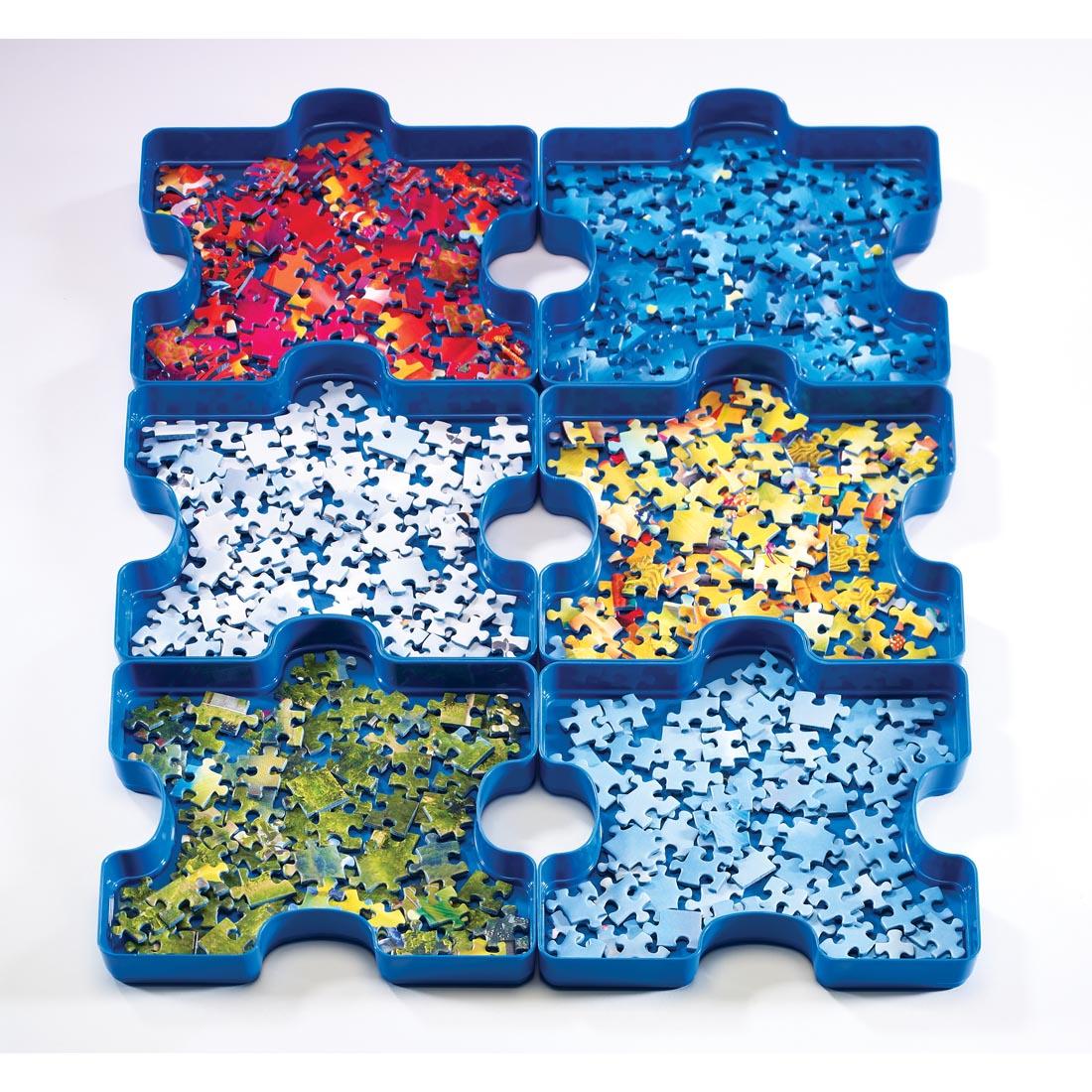 6 trays of Puzzle Sort & Go! shown in use with puzzle pieces