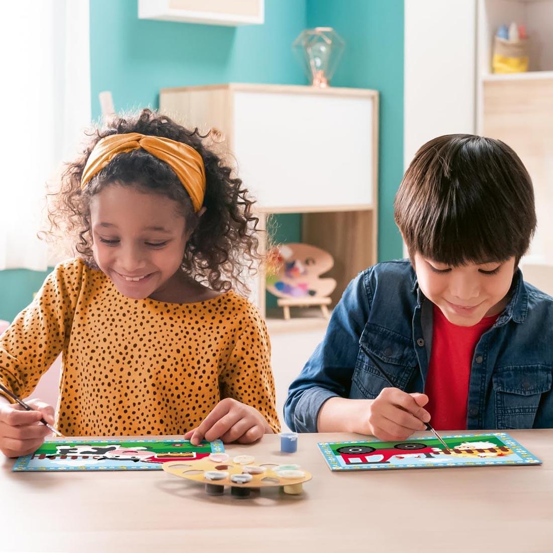 2 children using the Farm Kids Paint By Number Junior Set By Ravensburger