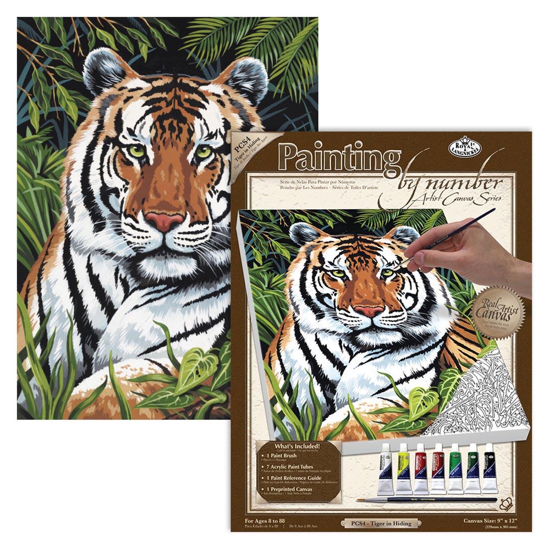 Royal & Langnickel Painting By Number Artist Canvas Series: Tiger in Hiding package with the completed painting behind it