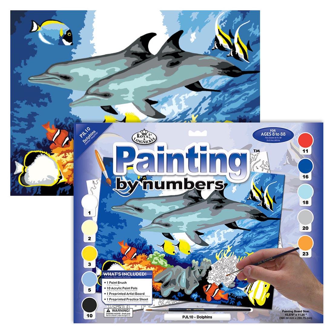 Package of the Royal & Langnickel Painting By Numbers Junior Large: Dolphins with a completed painting behind it