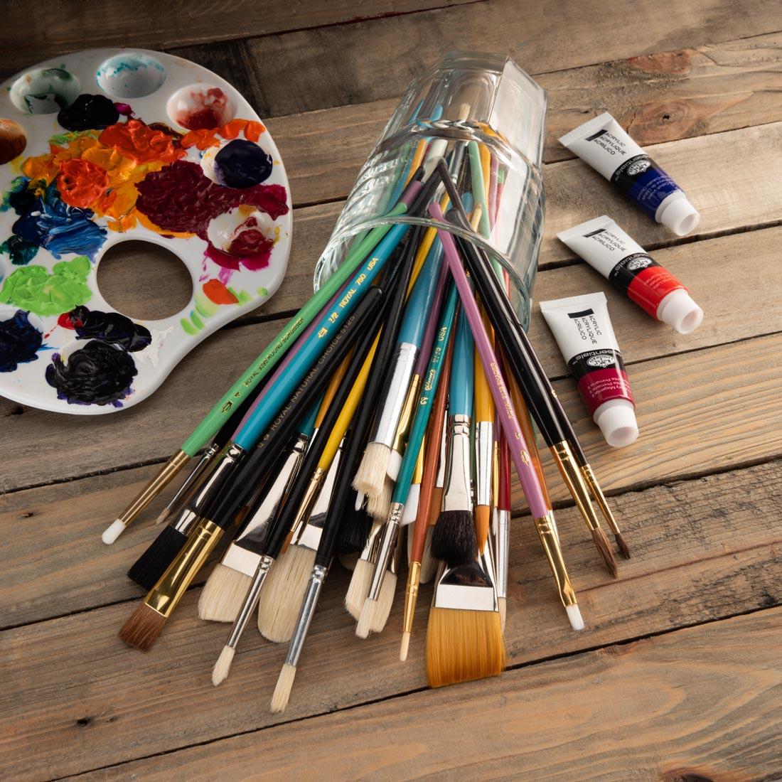 pile of Scratch And Dent Brushes by Royal & Langnickel among other art materials