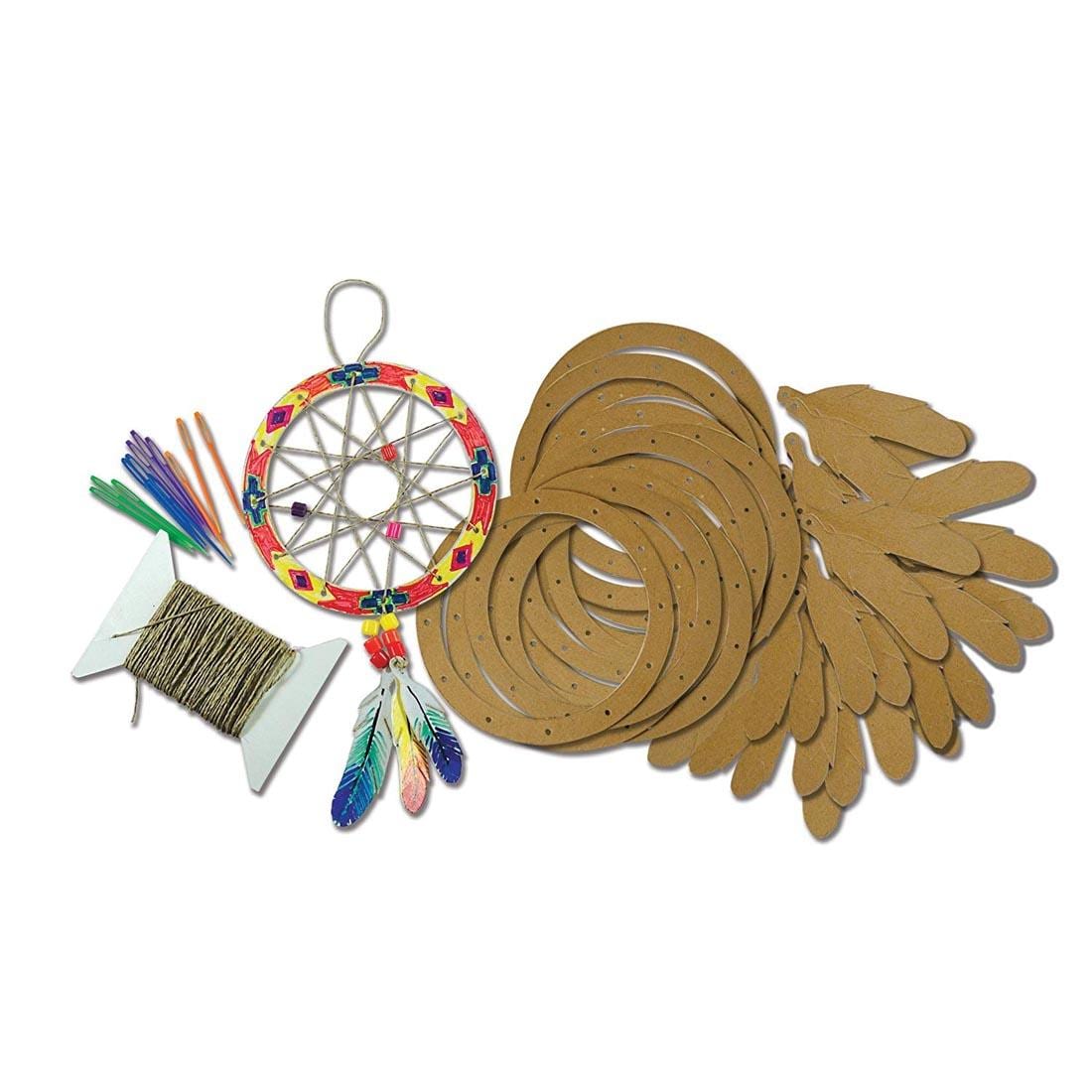 Contents of the Roylco Dream Catcher Kit shown with a completed example