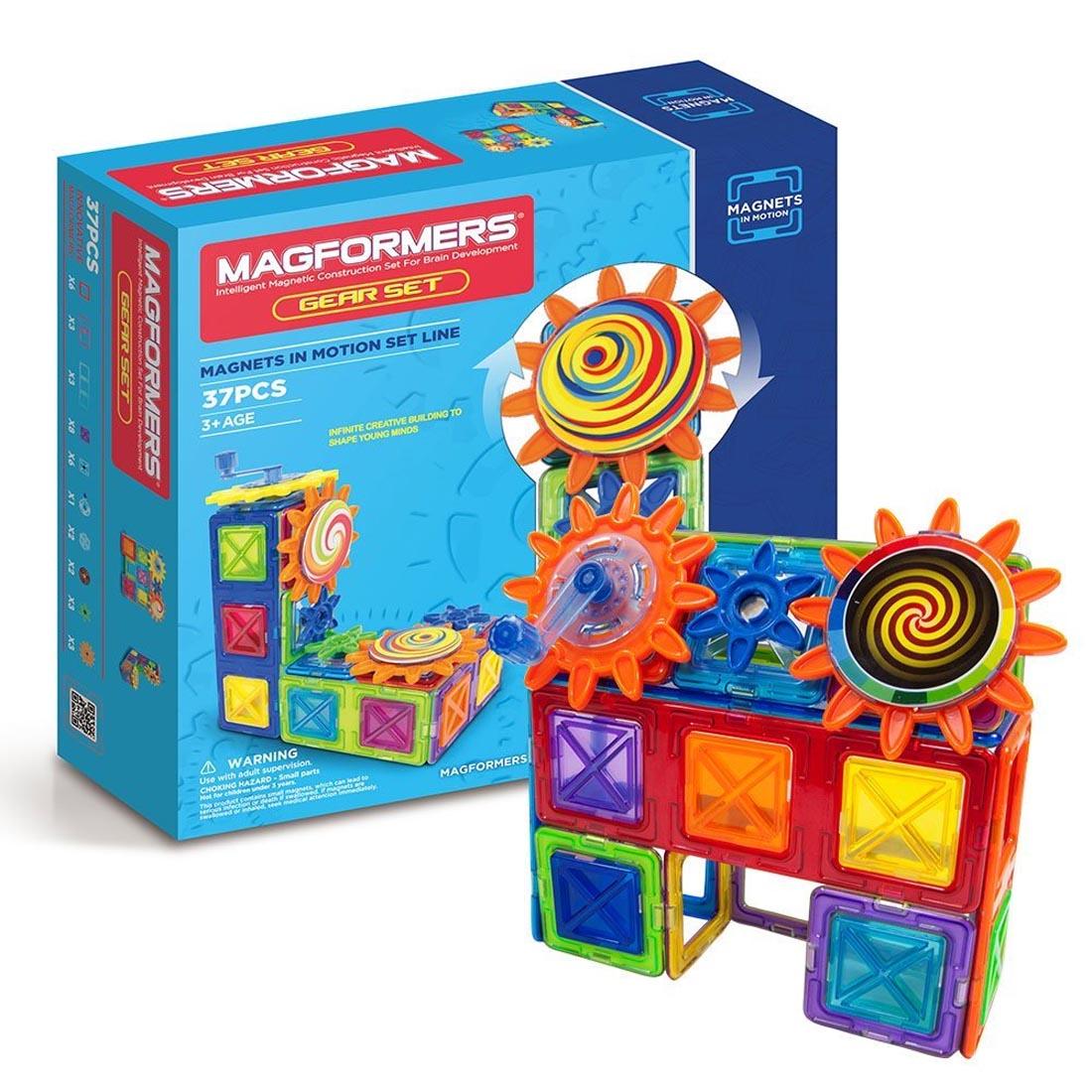 Package of Magformers Magnets in Motion 37-Piece Gear Set with an example construction in front