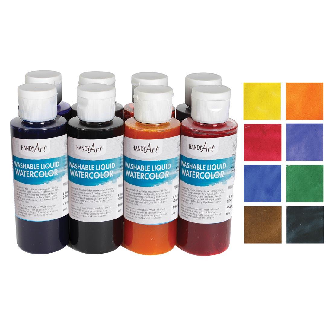 Bottles of the Handy Art Washable Liquid Watercolors 8-Color Set beside their color swatches
