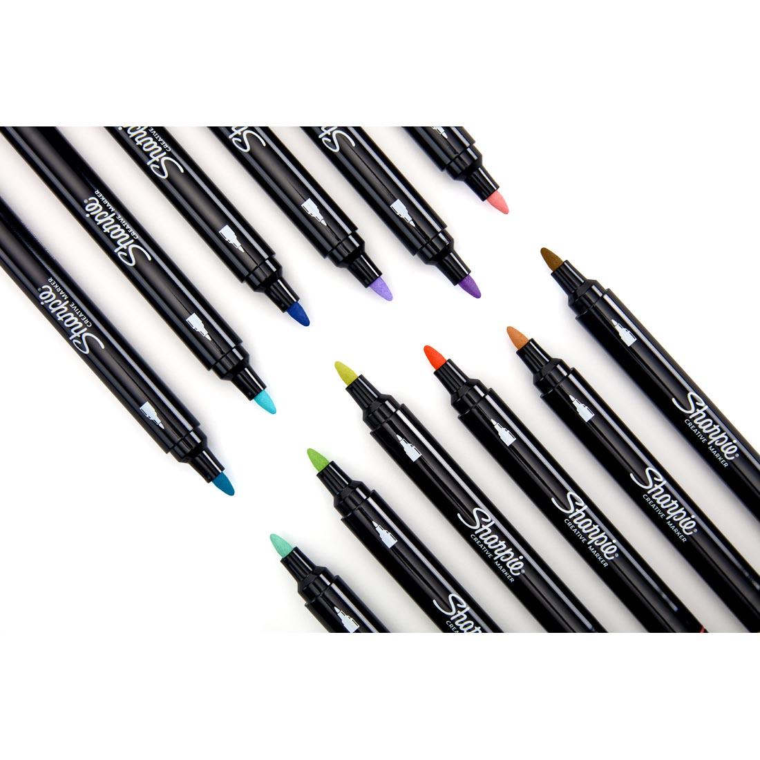 12 un-capped markers from the Sharpie Creative Bullet Tip Markers 12-Color Earth Tones Set