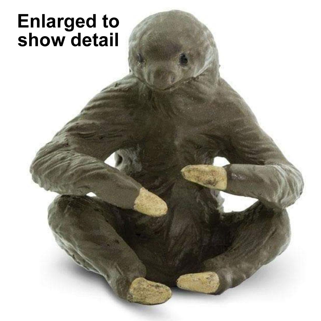 Sloth Figurine with the text Enlarged to Show Detail