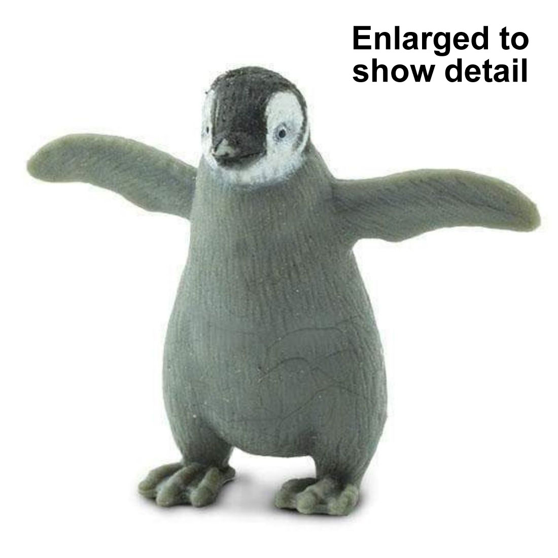 Emperor Penguin Chick Mini Figurine with the text Enlarged to Show Detail