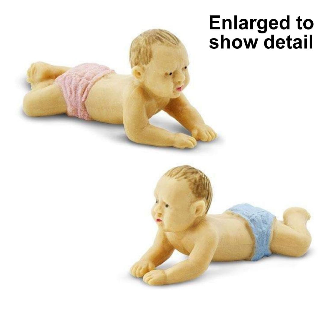 Two Baby Mini Figurines with the text Enlarged to Show Detail