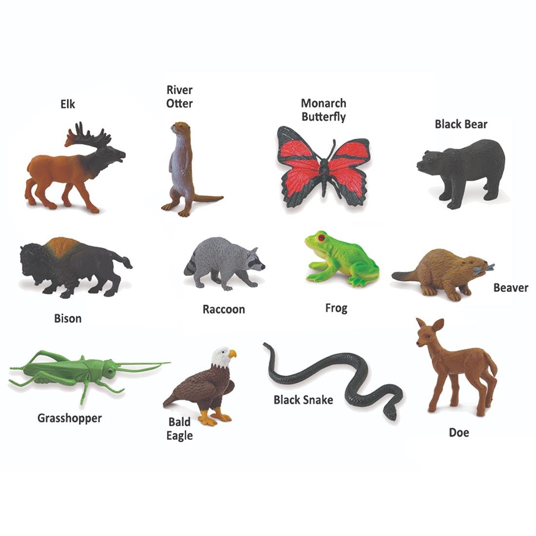 12 creatures from the In the Woods Figurine Set labeled with their names: elk, river otter, monarch butterfly, black bear, bison, raccoon, frog, beaver, grasshopper, bald eagle, black snake, doe