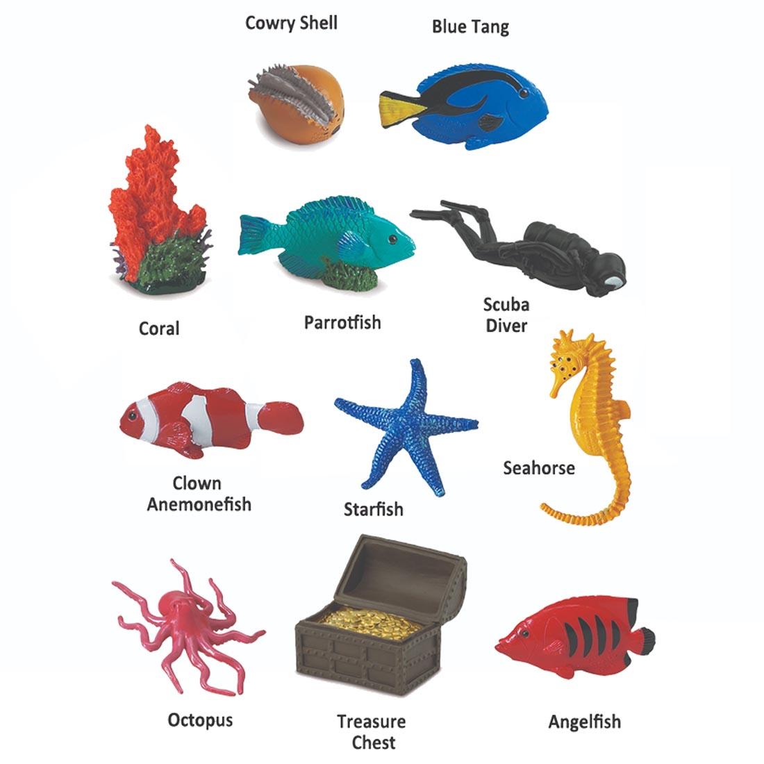 11 pieces from the Coral Reef Figurines Set labeled with their names: cowry shell, blue tang, coral, parrotfish, scuba diver, clown anemonefish, starfish, seahorse, octopus, treasure chest, angelfish