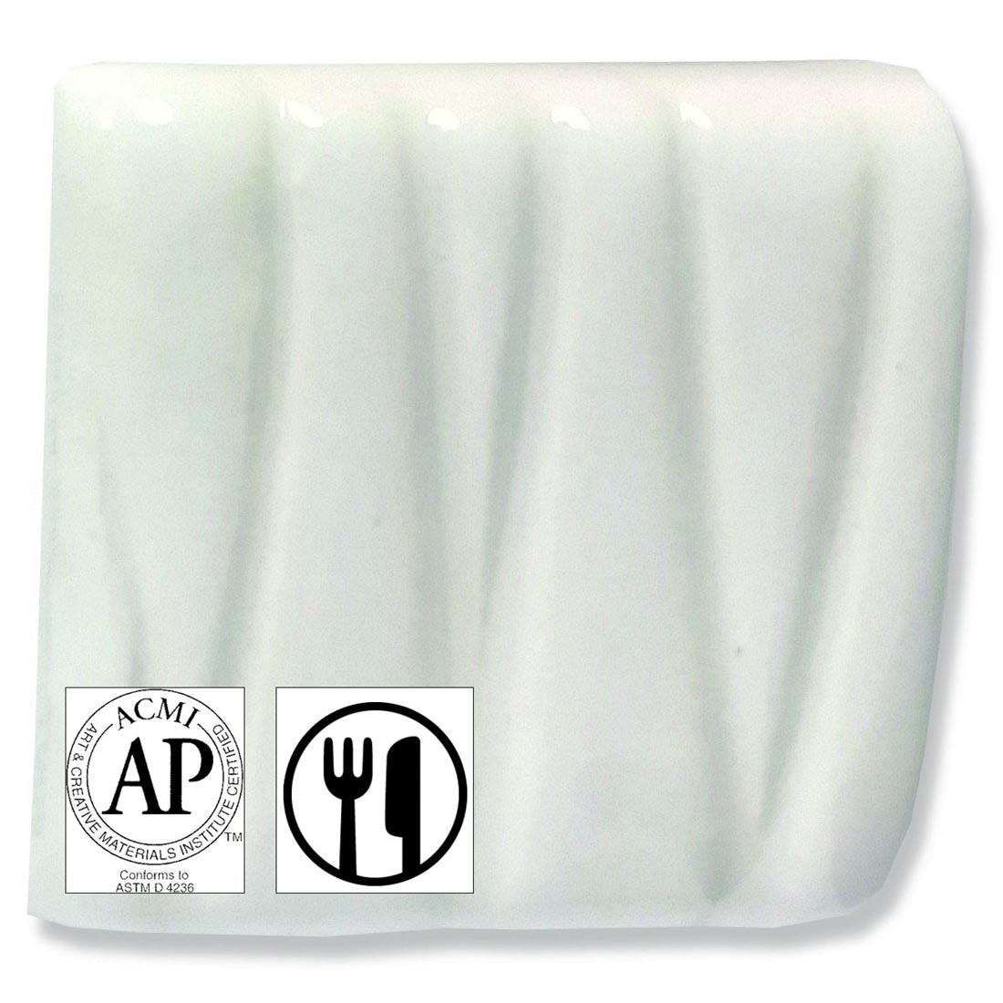 clay tile with Bright White Speedball Low Fire Earthenware Glaze applied; symbols for AP Seal and food safe