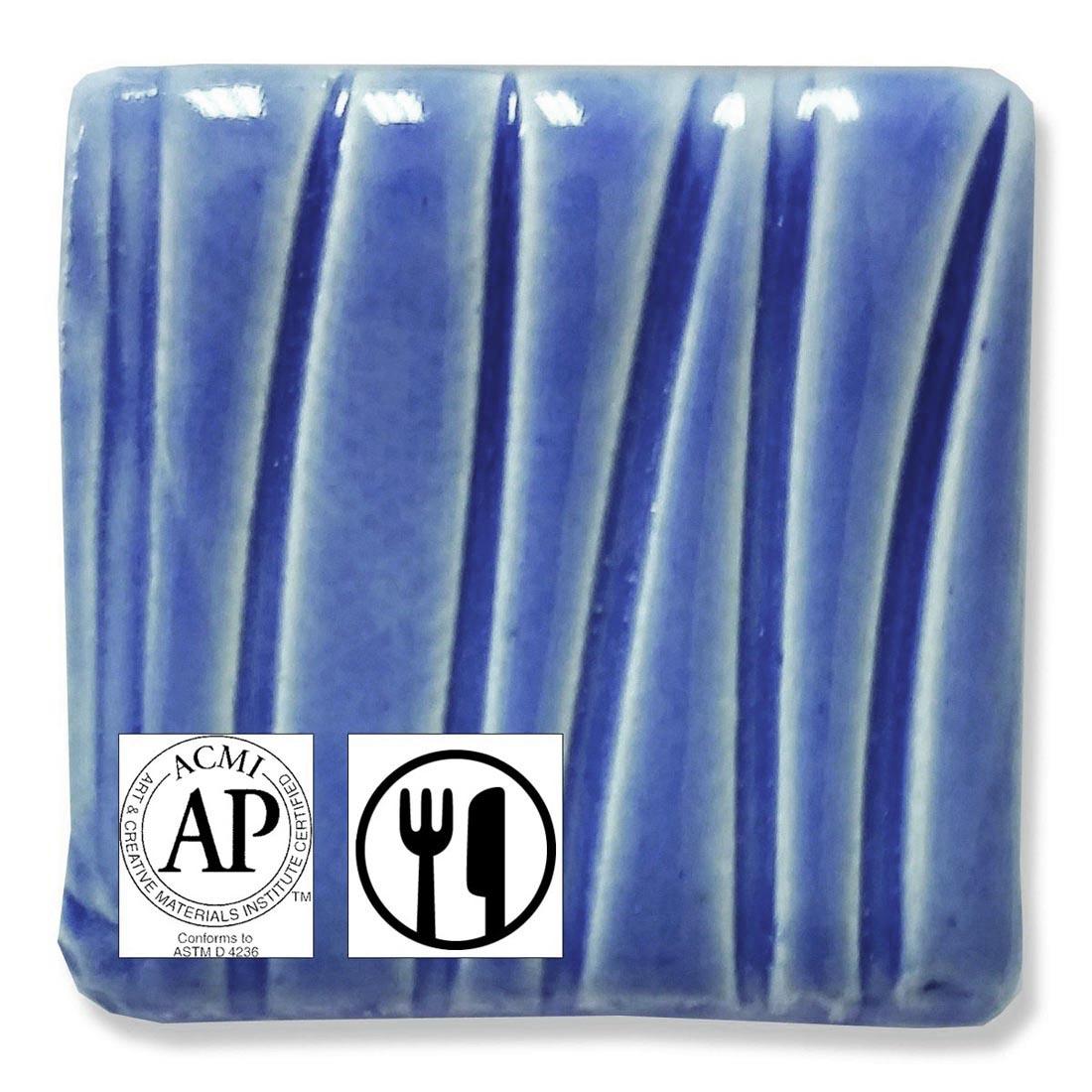 clay tile with Medium Blue Speedball Low Fire Earthenware Glaze applied; symbols for AP Seal and food safe