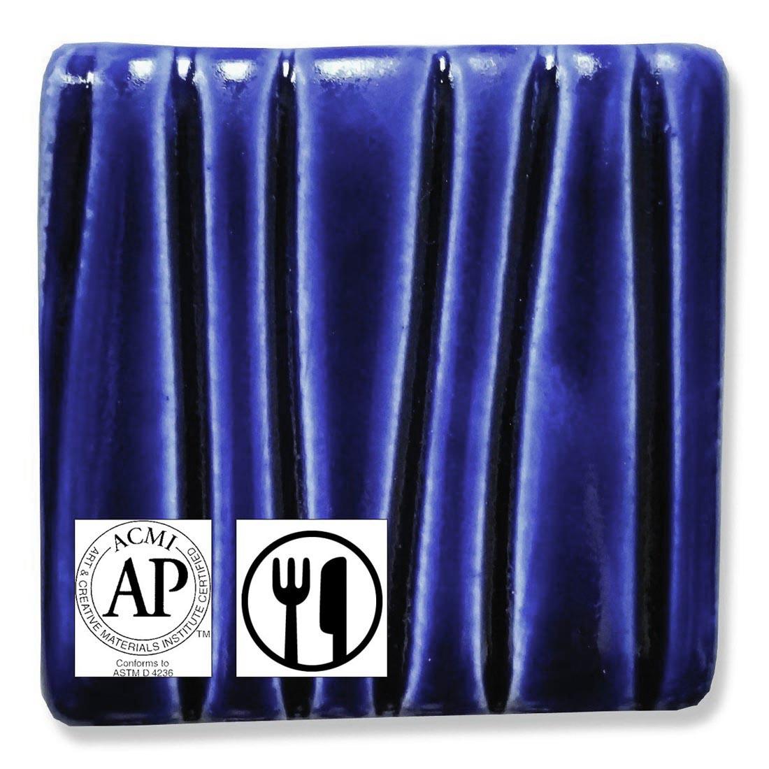 clay tile with Royal Blue Speedball Low Fire Earthenware Glaze applied; symbols for AP Seal and food safe