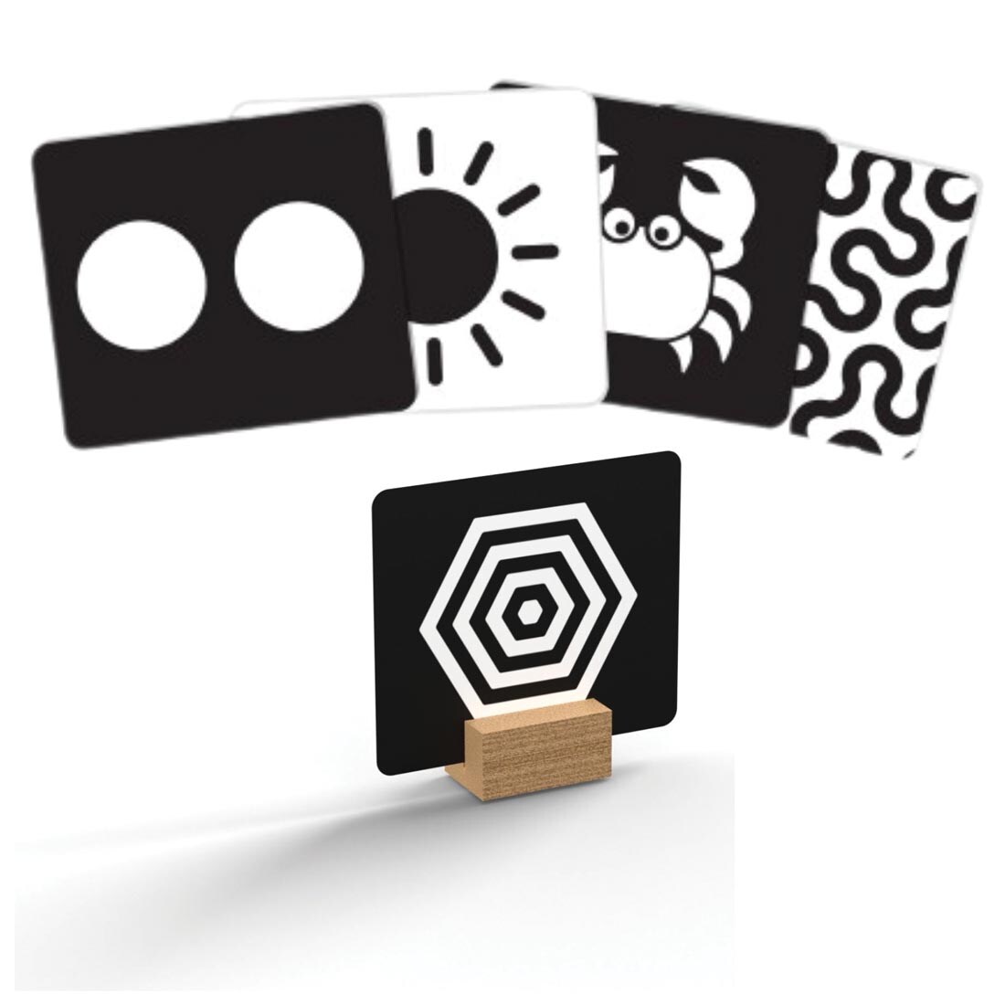 sample black and white, high contrast flash cards, with one placed in a wooden holder
