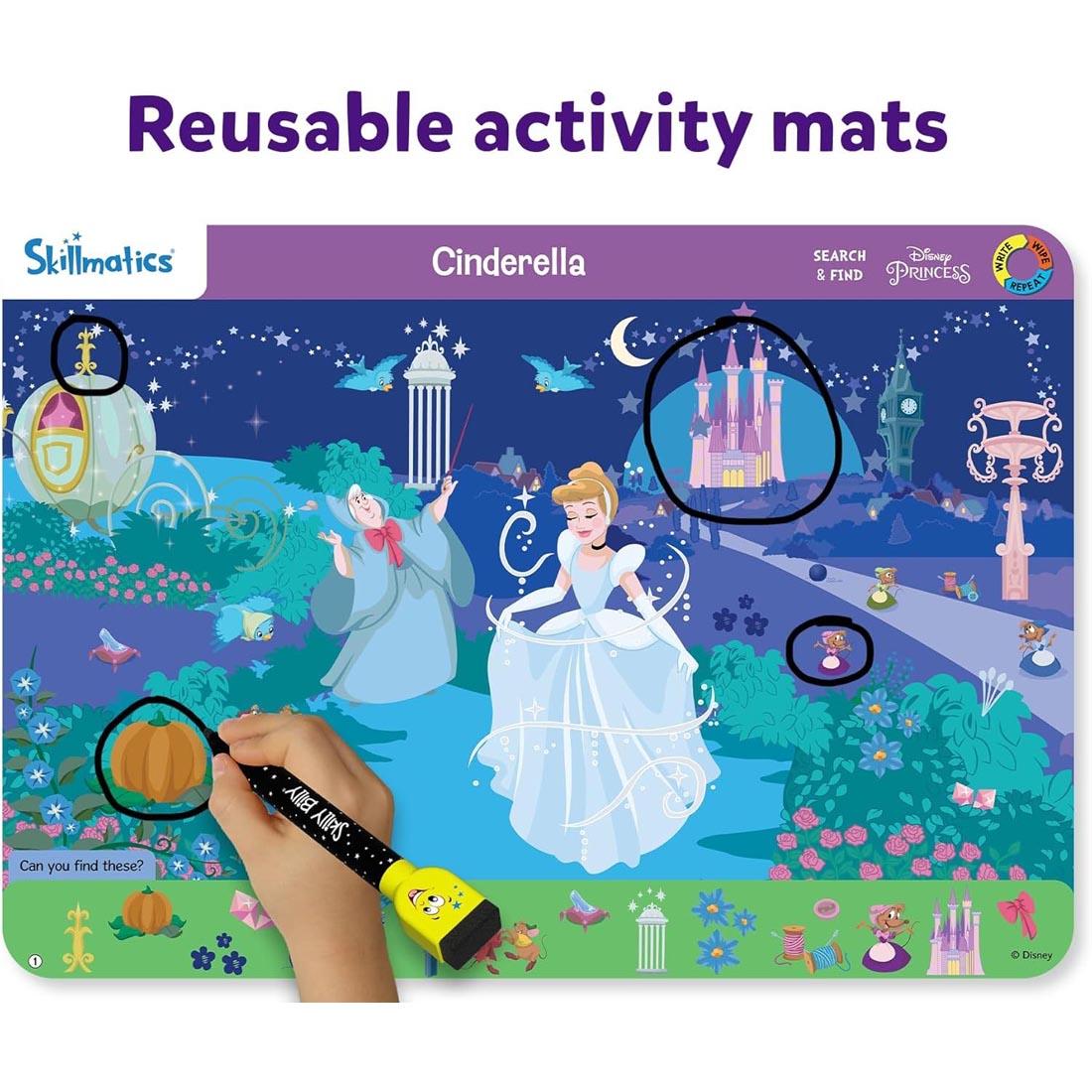 hand circling items on one of the Search & Find Disney Princess Write And Wipe Activity Mats By Skillmatics with text: Reusable activity mats