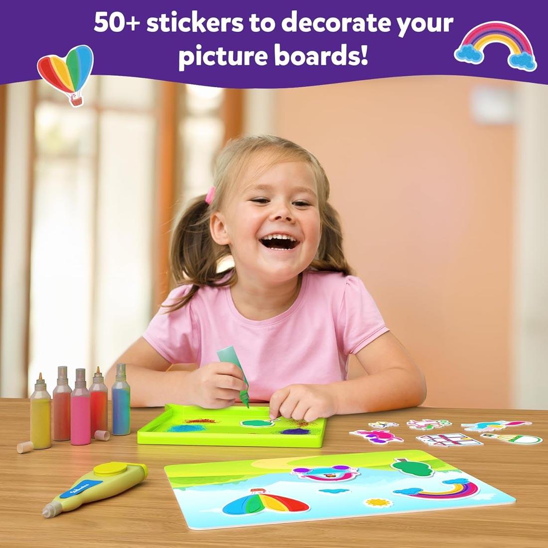 girl creating sand stickers, with the words: 50+ stickers to decorate your picture boards!