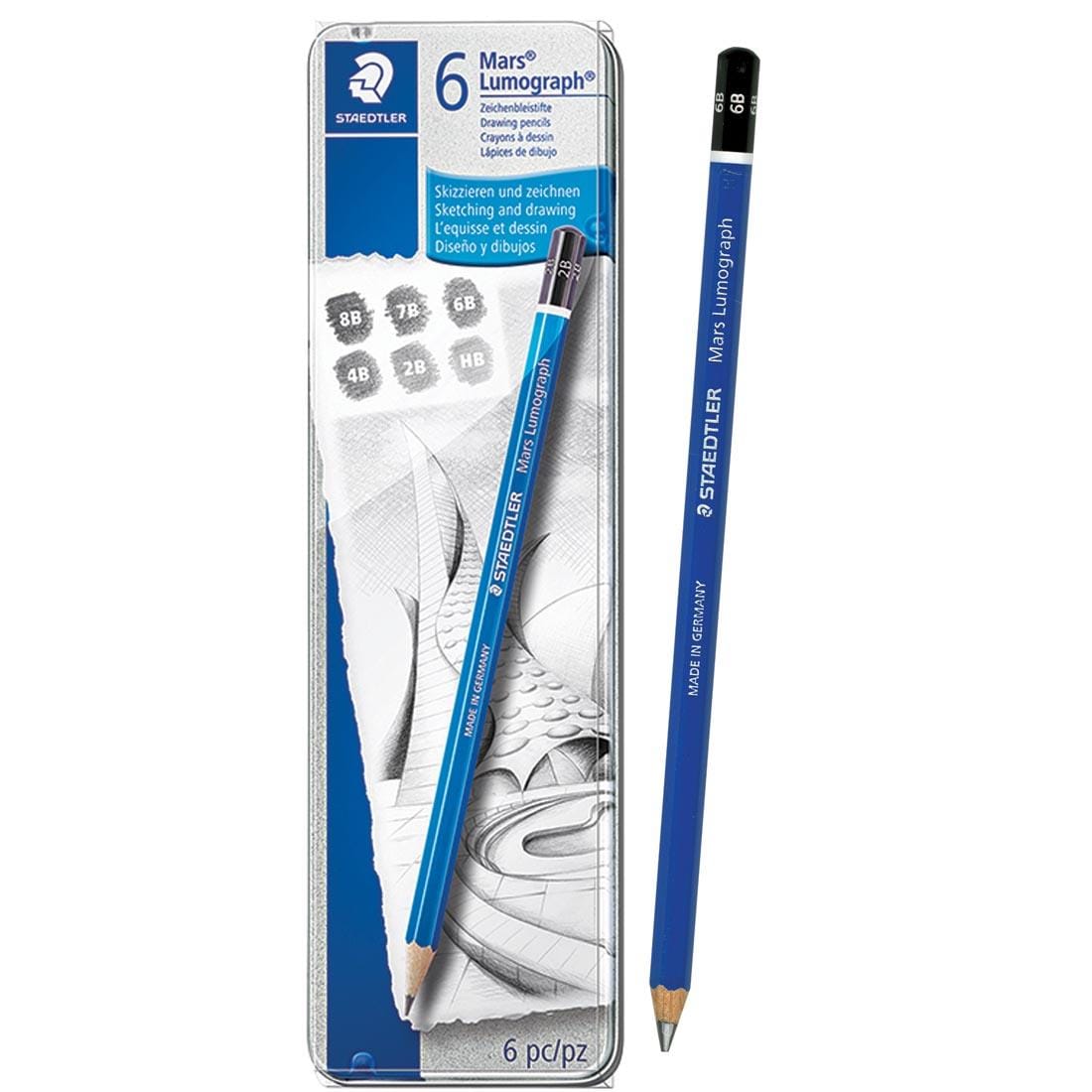 Staedtler Mars Lumograph Drawing Pencils 6-Count Set Metal Tin with individual pencil beside it