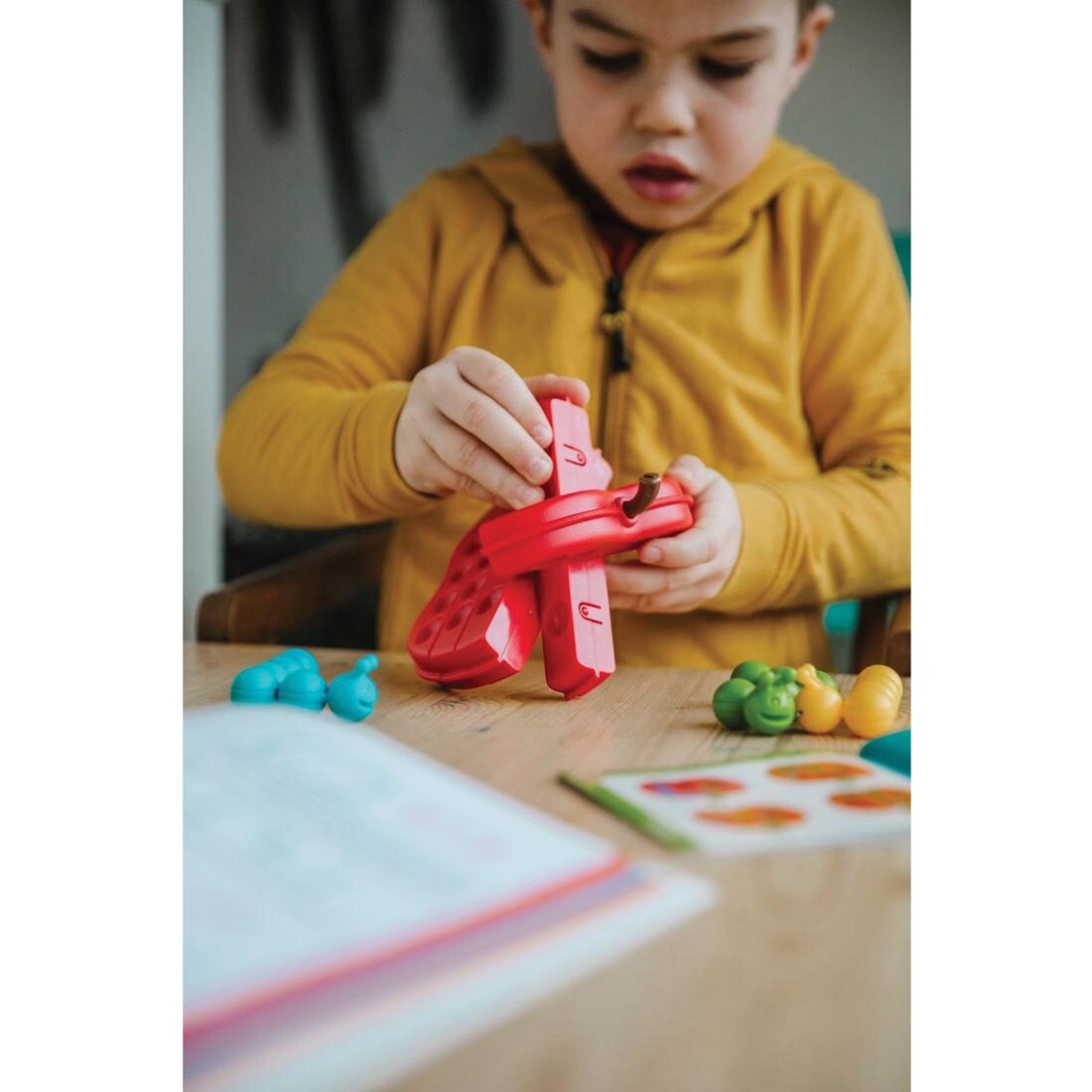 Child working on the Apple Twist Puzzle Game