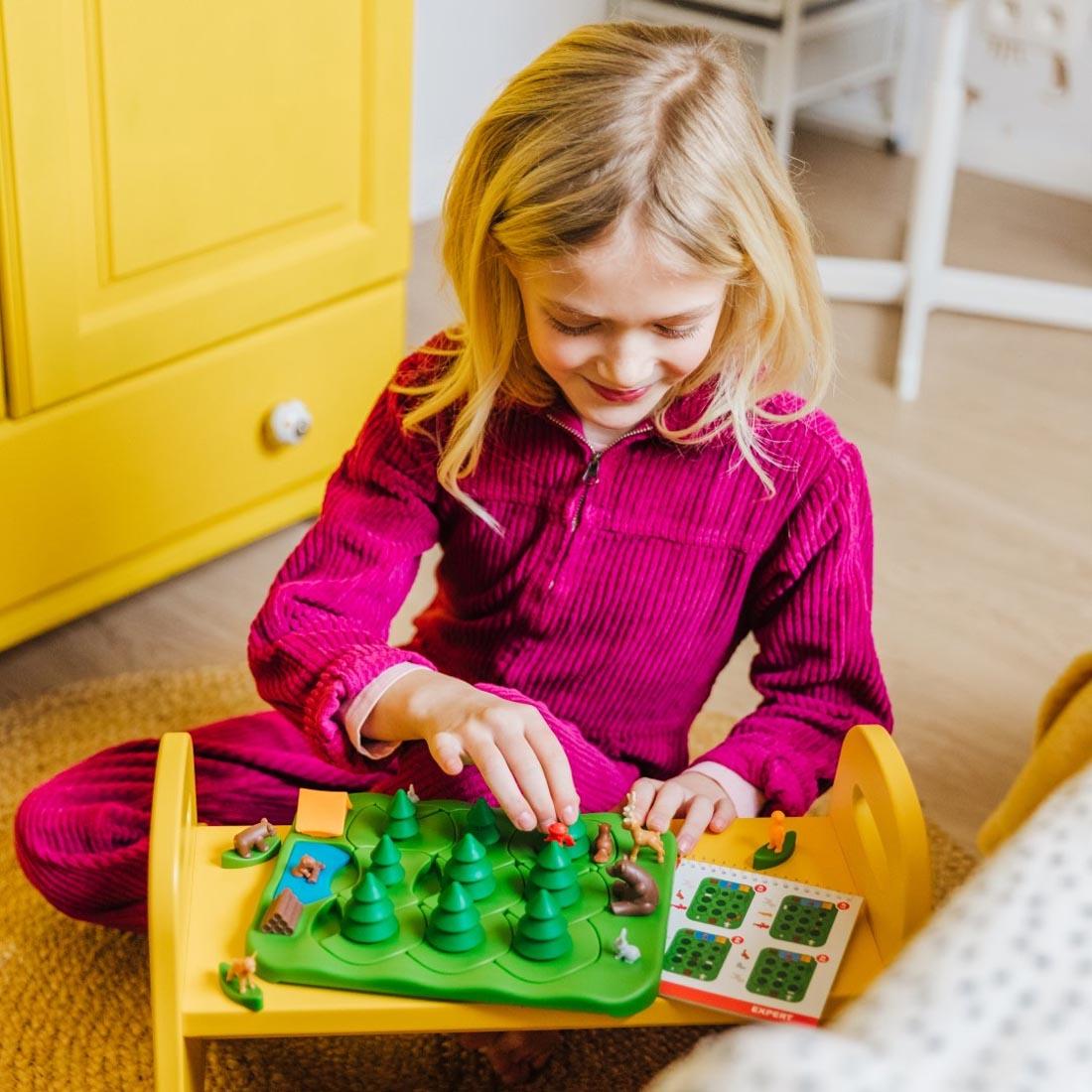 Child playing with the Grizzly Gears Puzzle Game